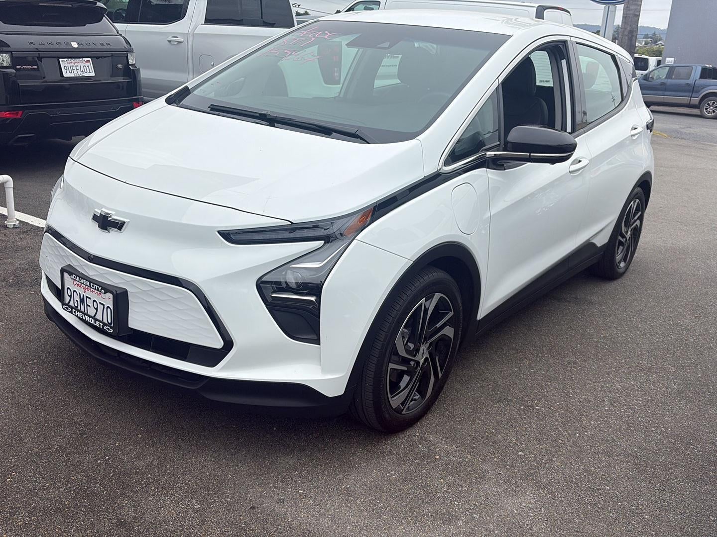 2023 Chevrolet Bolt EV 2LT in Summit White — front three-quarter view