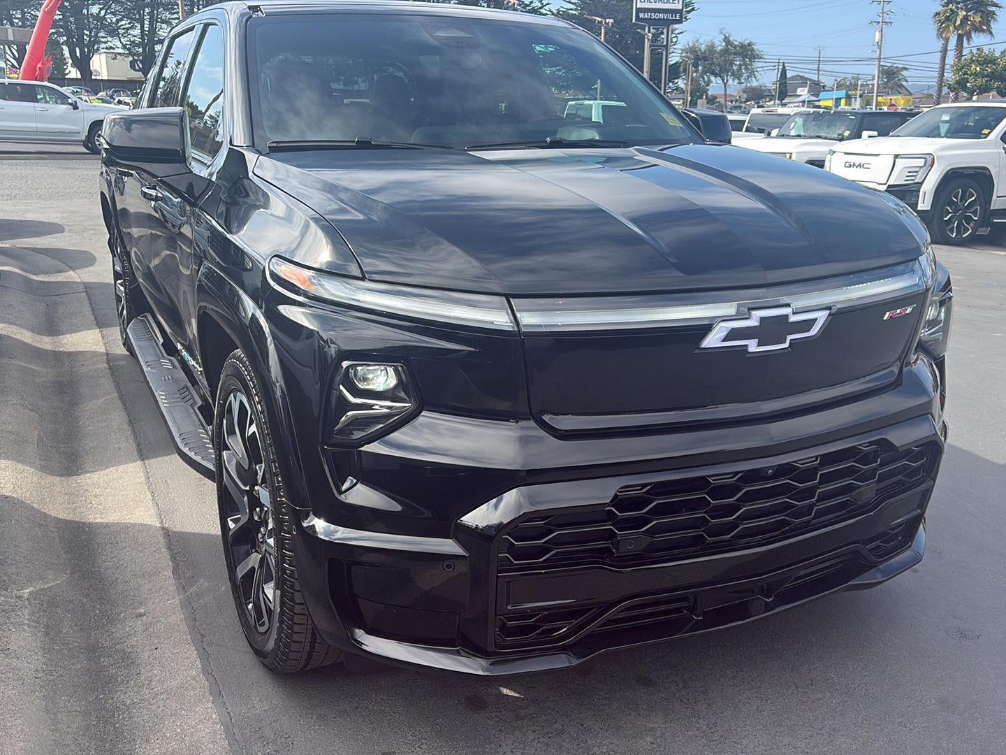 2025 Chevrolet Silverado EV RST - Max Range in Black — front three-quarter view