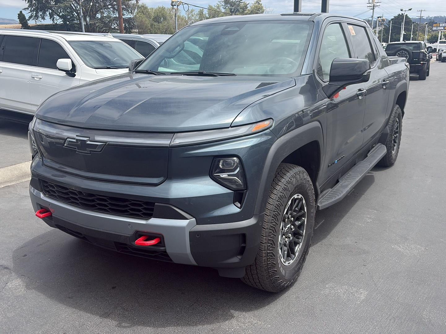 2026 Chevrolet Silverado EV Trail Boss - Max Range in Blue Smoke Metallic — front three-quarter view