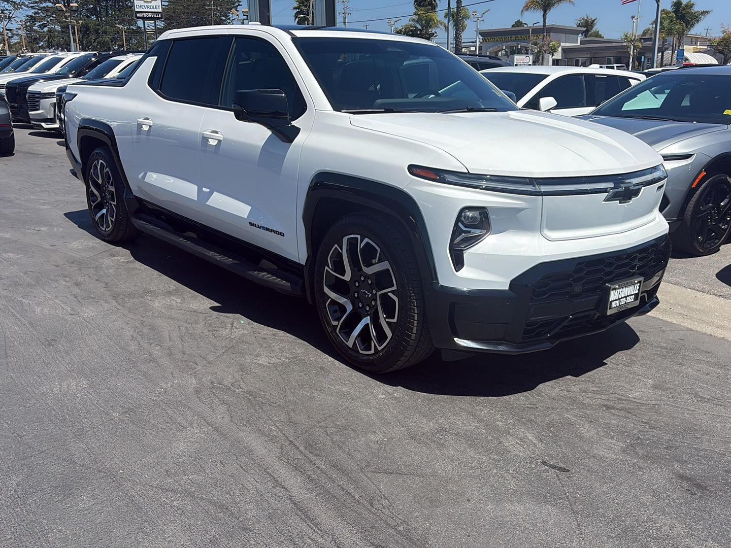 2024 Chevrolet Silverado EV RST in Summit White — front three-quarter view