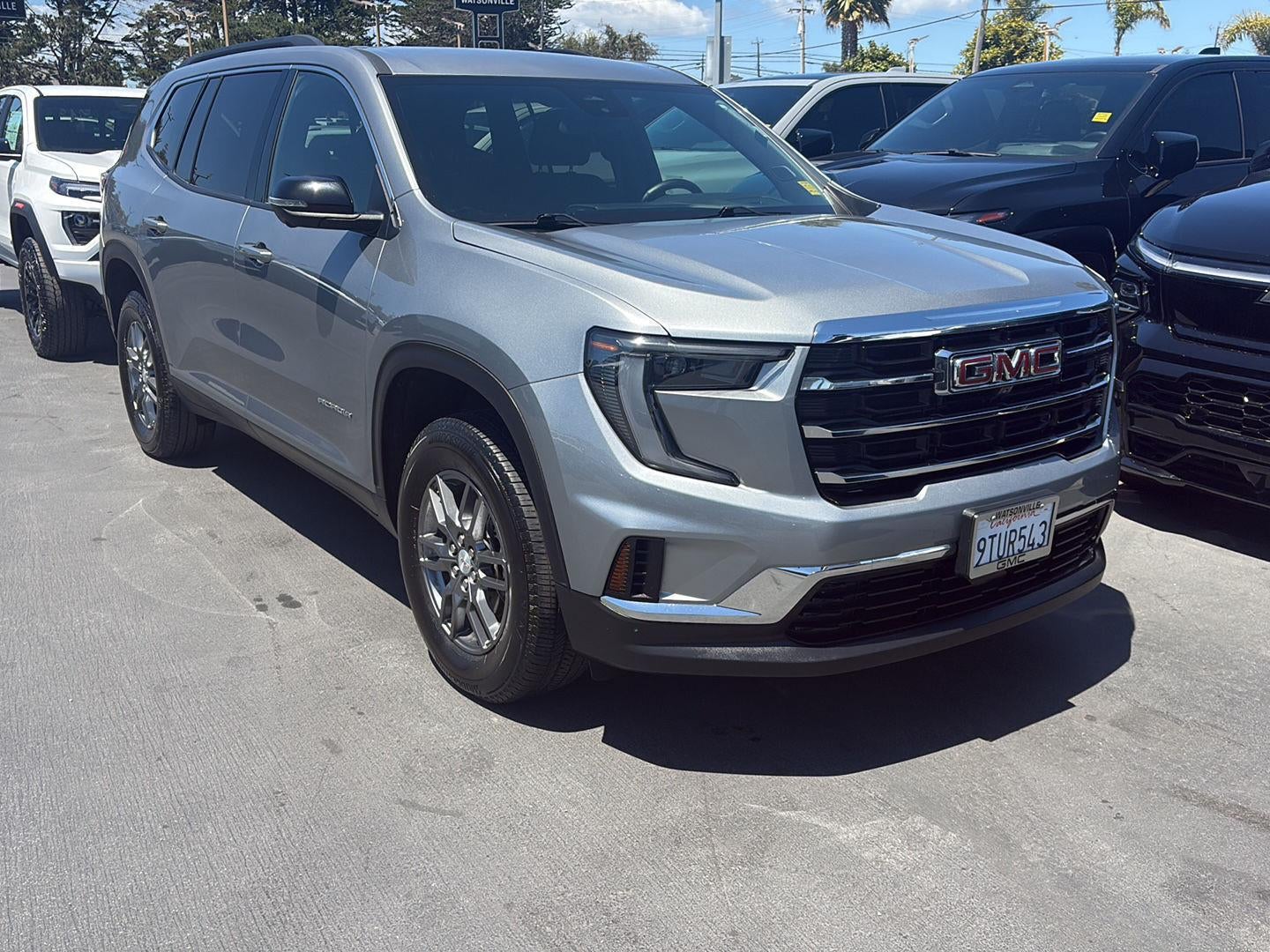 2025 GMC Acadia Elevation in Sterling Metallic — front three-quarter view