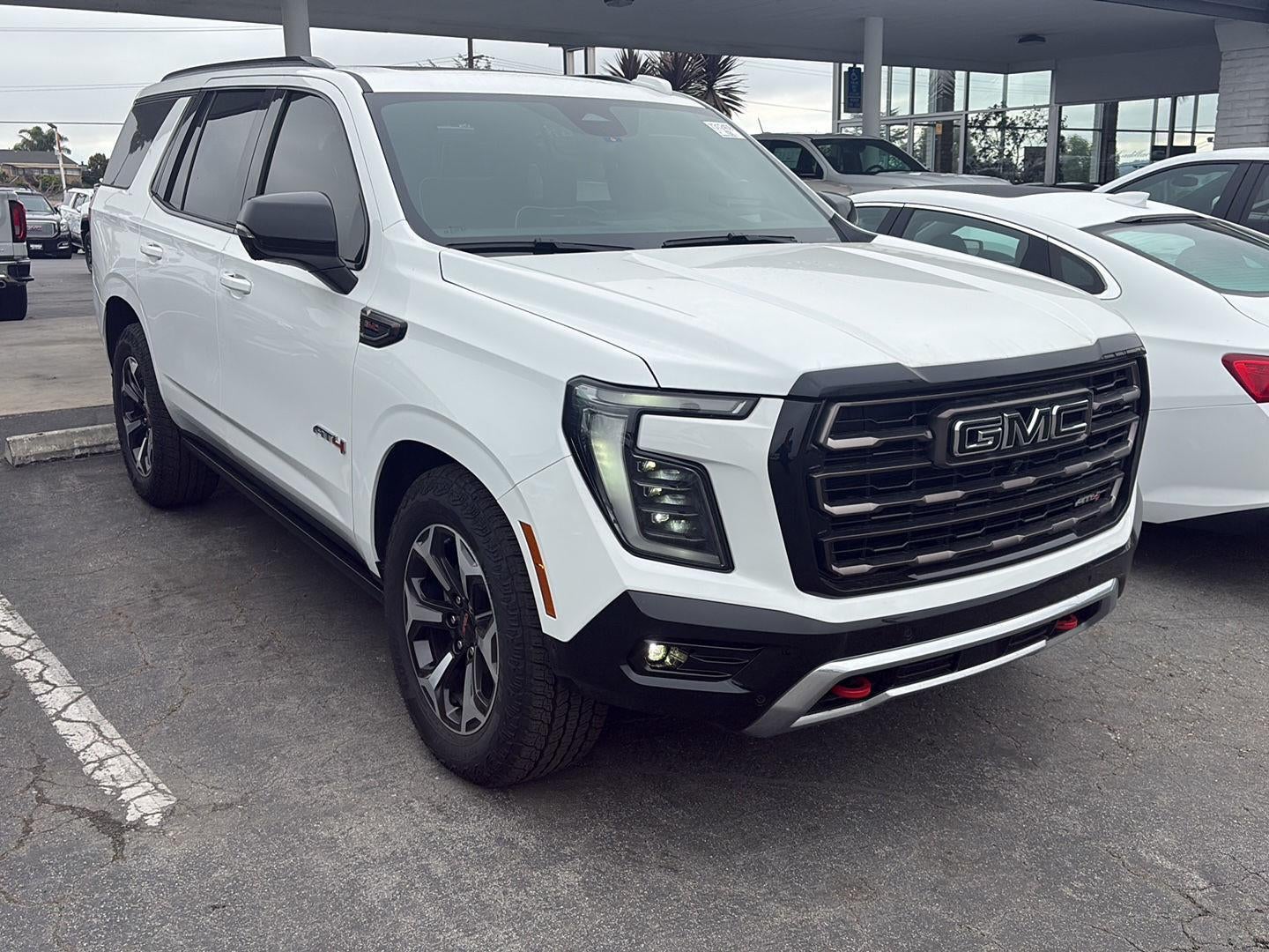 2026 GMC Yukon AT4 Ultimate in Summit White — front three-quarter view