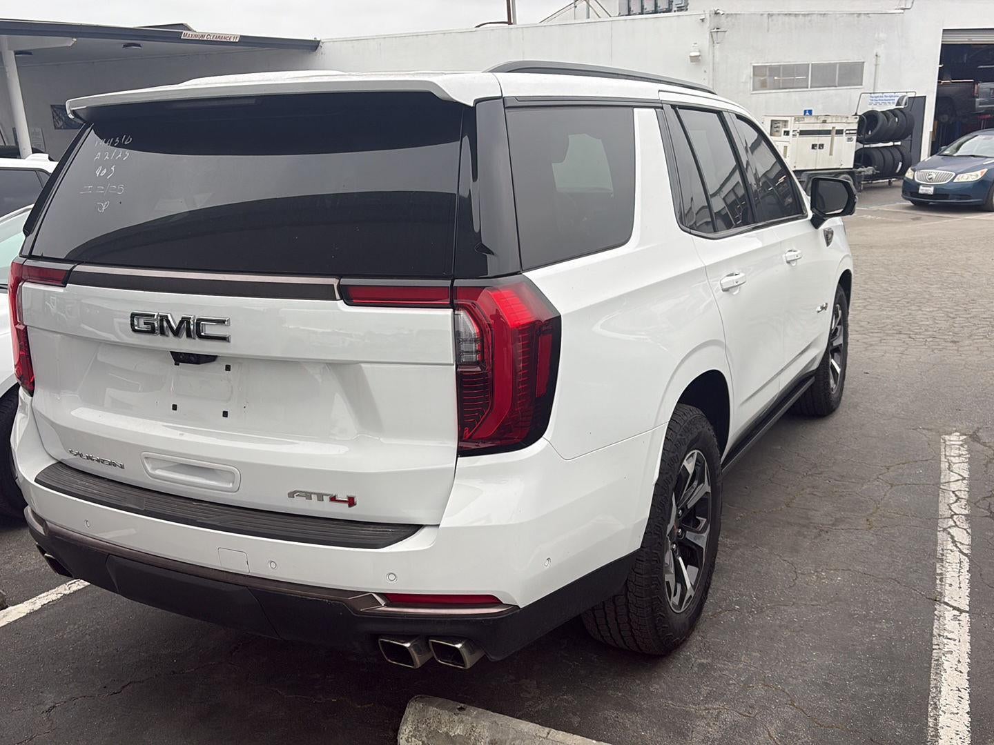 2026 GMC Yukon — rear three-quarter view