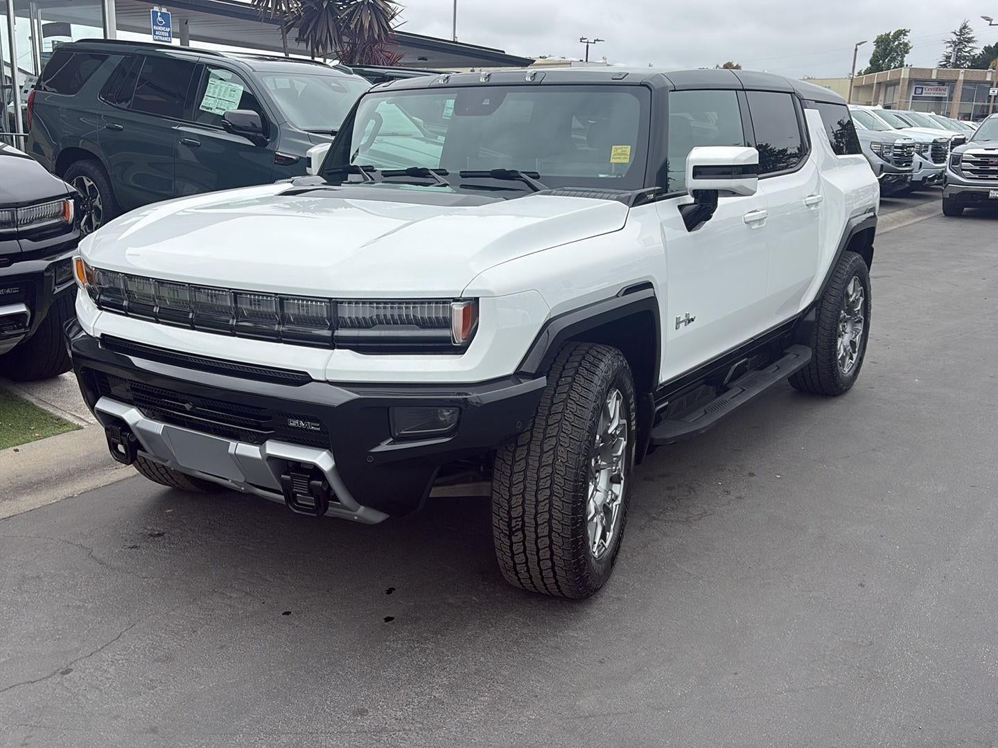 2025 GMC HUMMER EV SUV 3X in Interstellar White — front three-quarter view