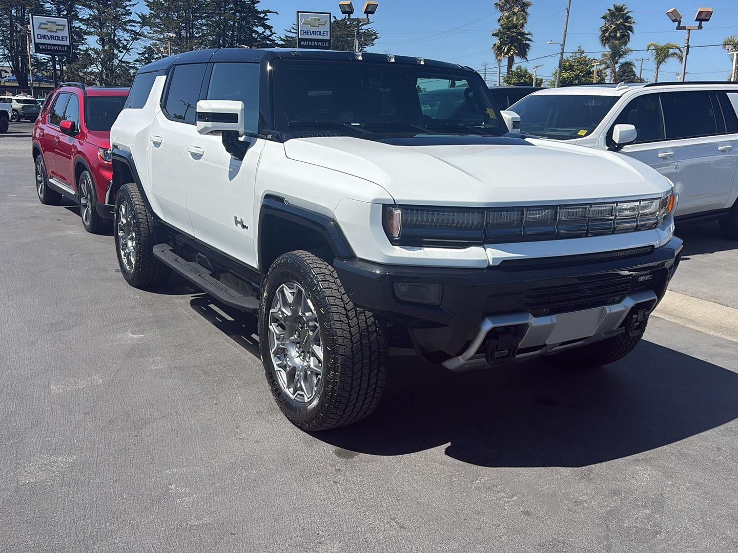 2025 GMC HUMMER EV SUV 3X in Interstellar White — front three-quarter view