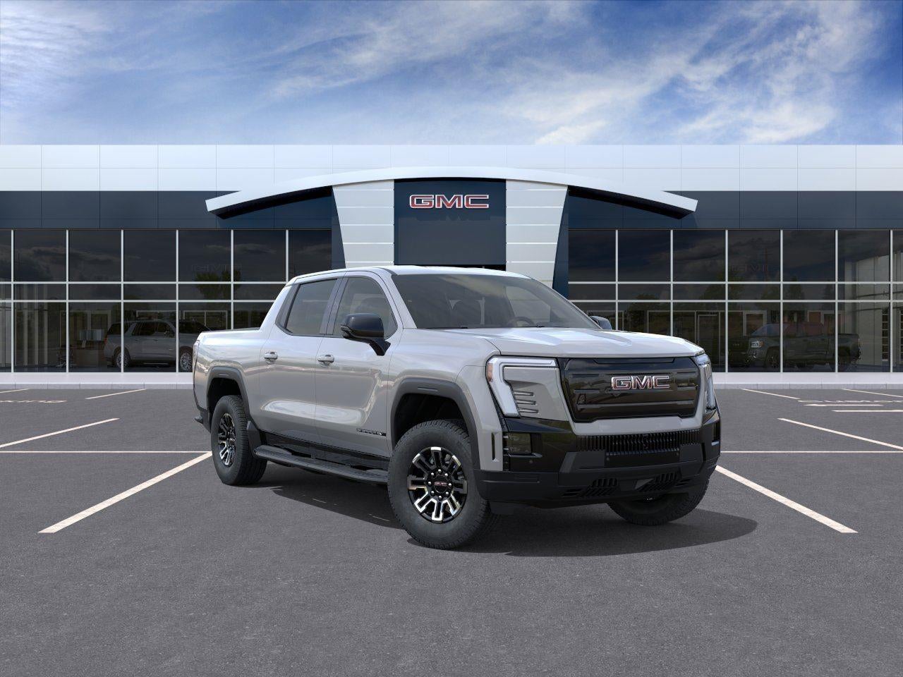 2026 GMC Sierra EV Elevation Standard Range in Thunderstorm Gray — front three-quarter view