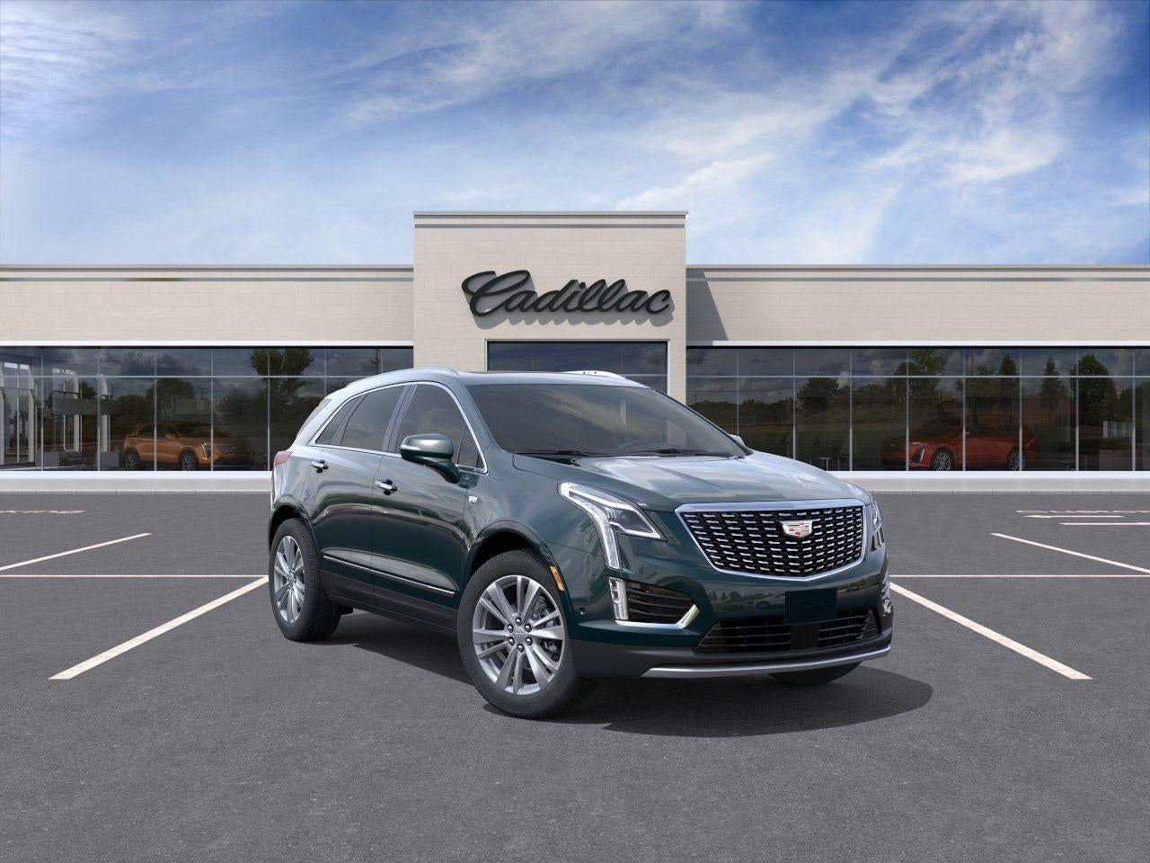 2026 Cadillac XT5 Premium Luxury in Emerald Lake Metallic — front three-quarter view