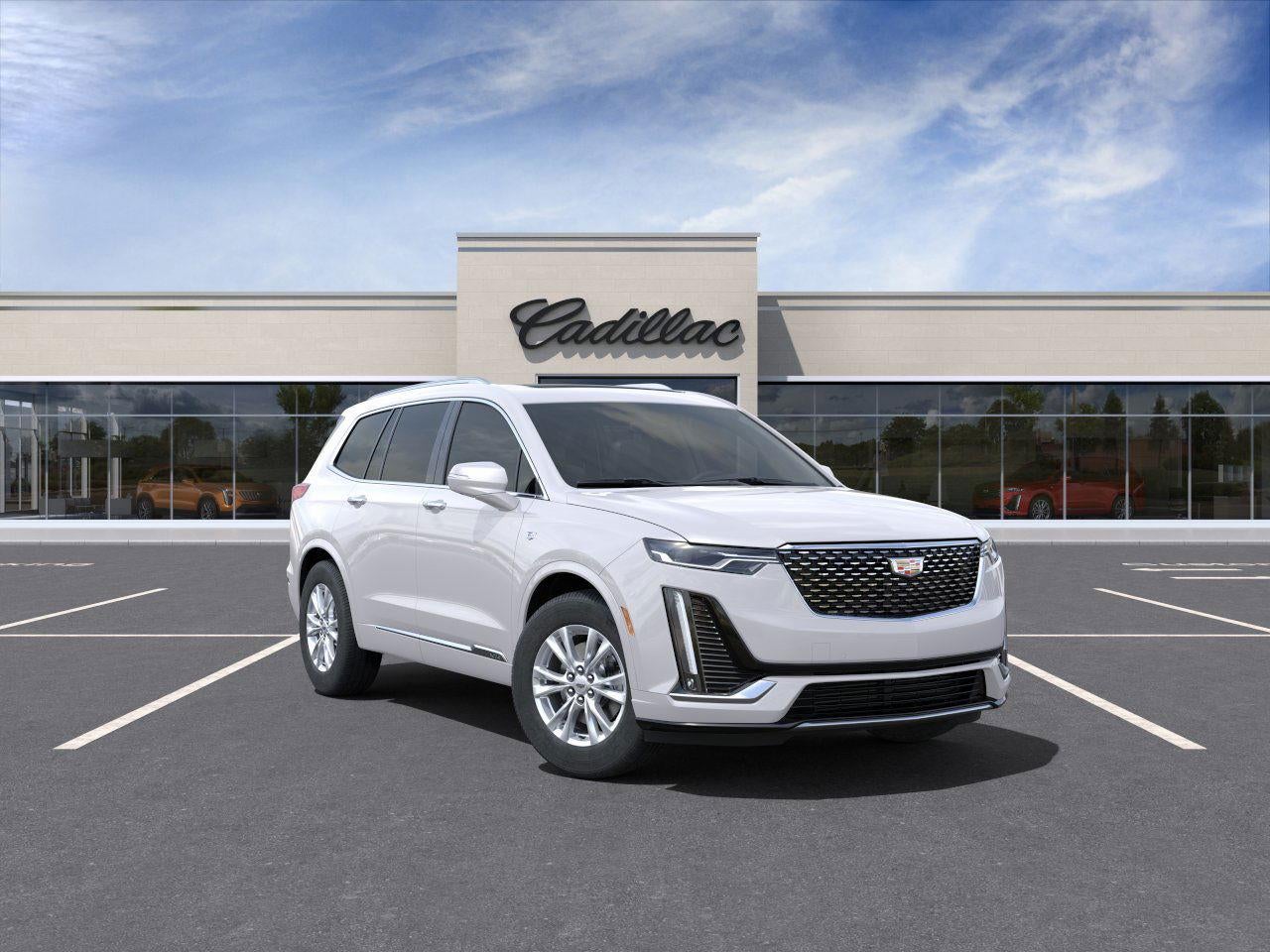 2025 Cadillac XT6 Luxury in Crystal White Tricoat — front three-quarter view