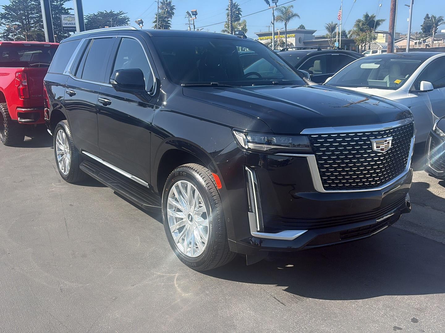 2024 Cadillac Escalade Premium Luxury in Black Raven — front three-quarter view