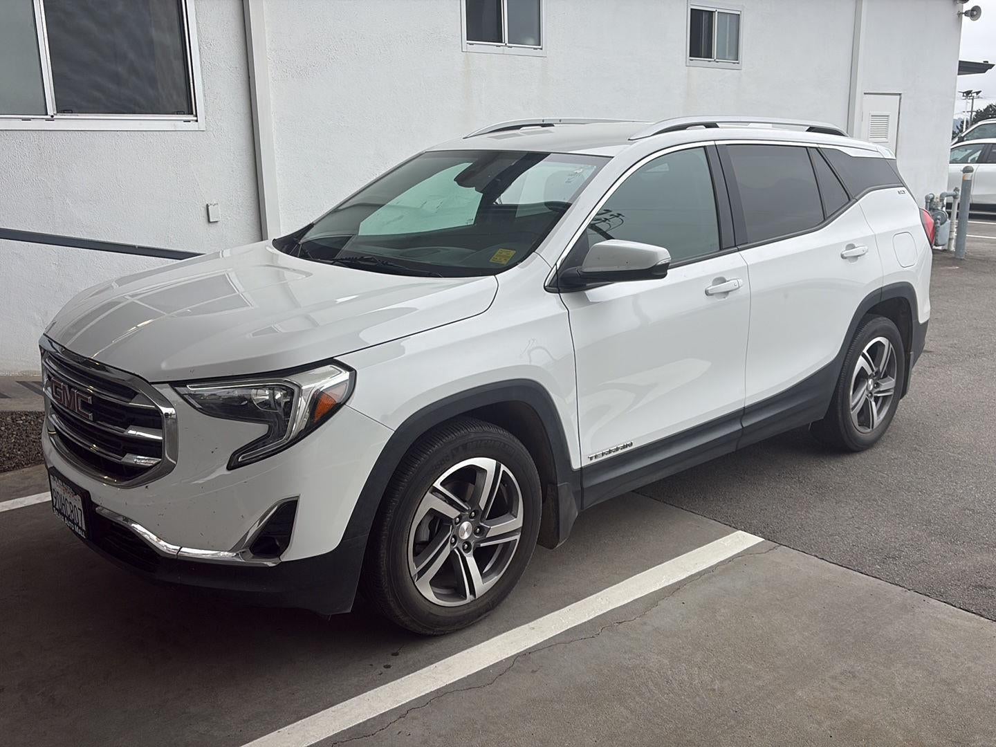 2019 GMC Terrain SLT in Summit White — front three-quarter view