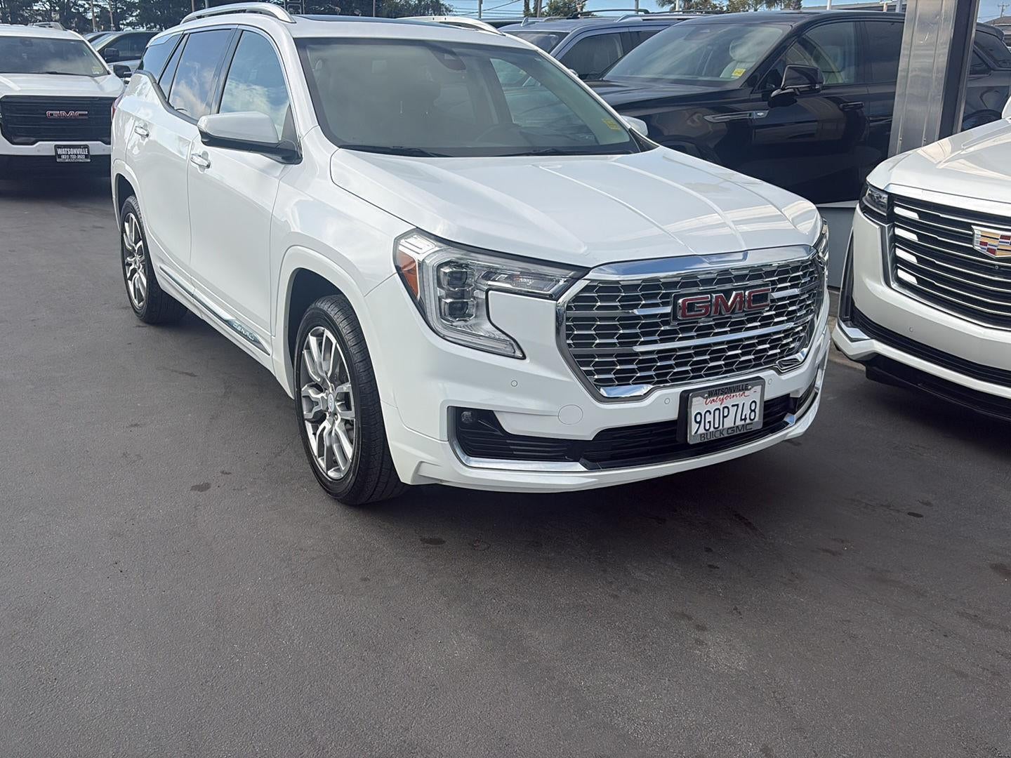2023 GMC Terrain Denali in Summit White — front three-quarter view