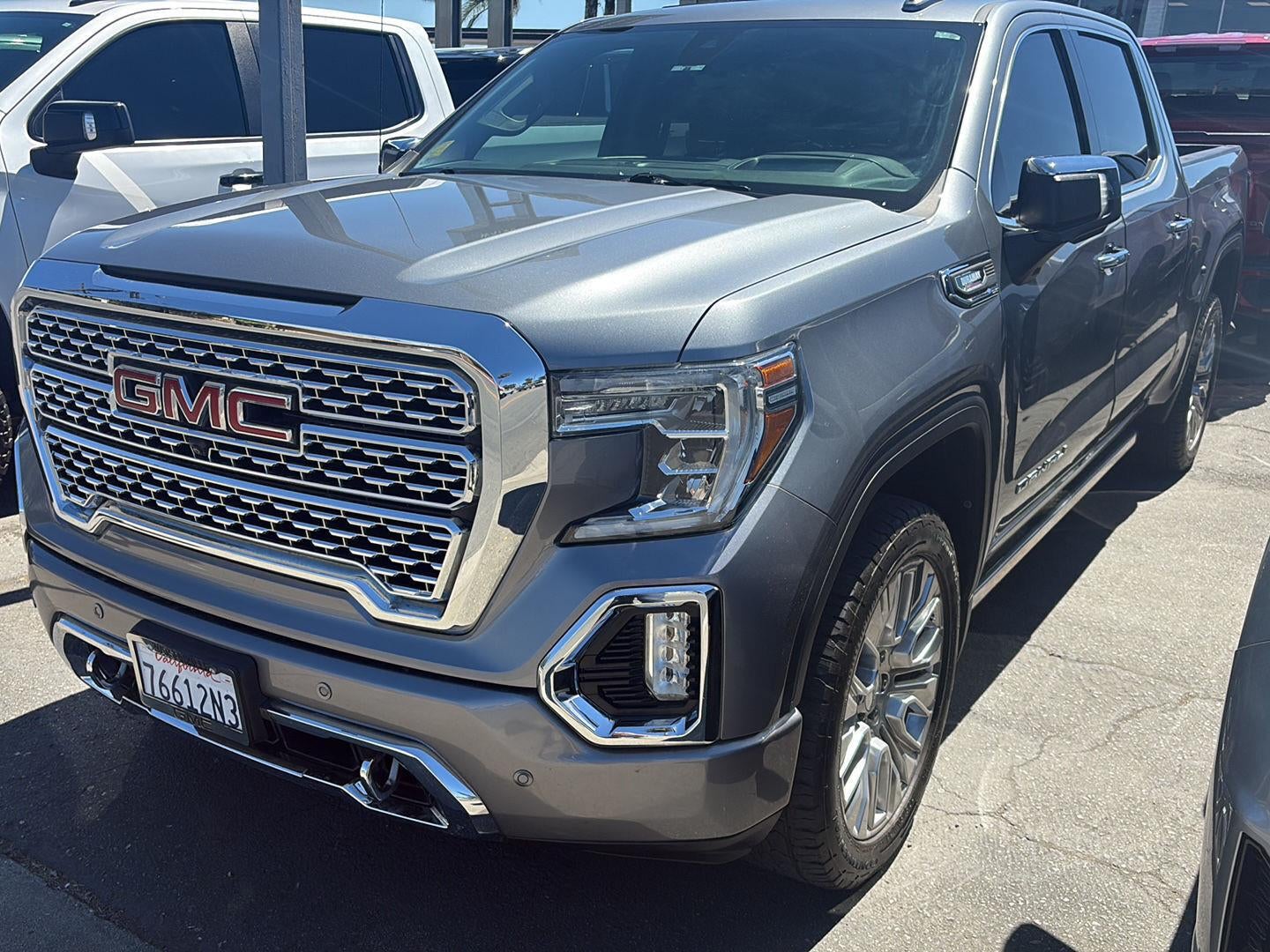 2021 GMC Sierra 1500 Denali in Satin Steel Metallic — front three-quarter view