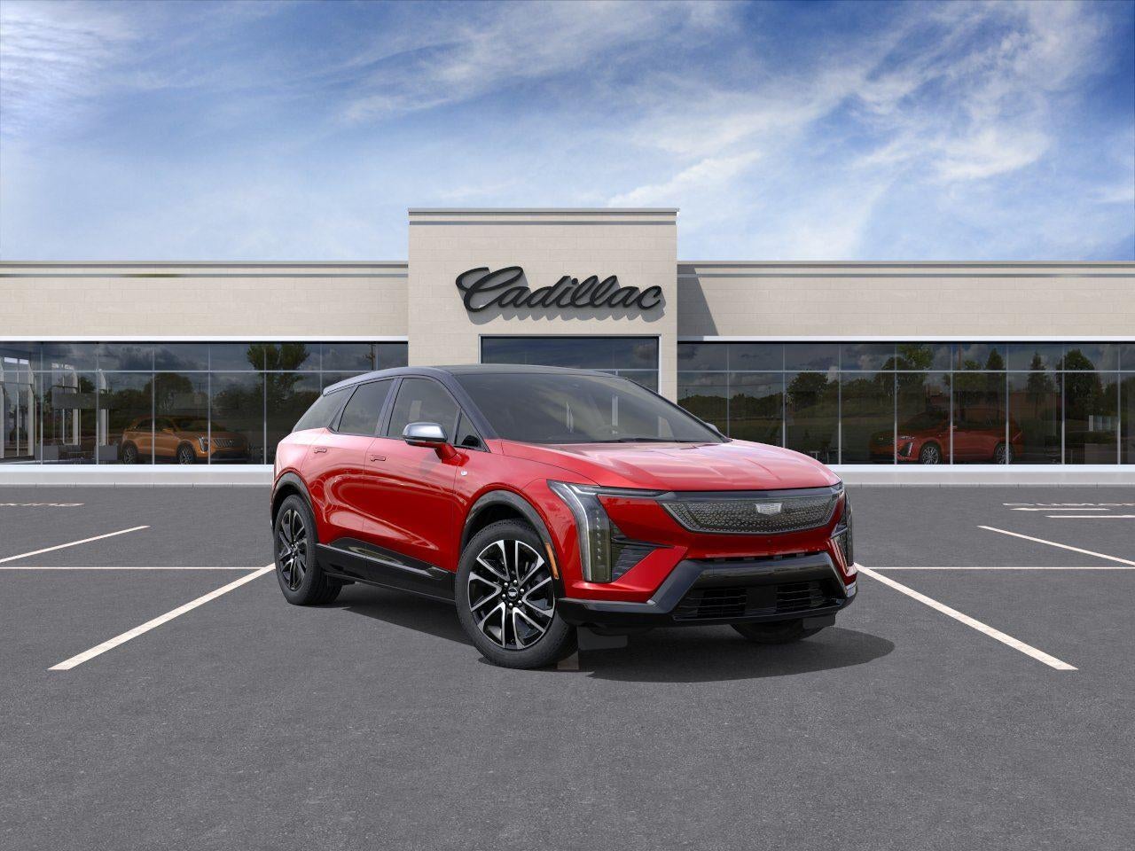 2026 Cadillac OPTIQ Sport in Radiant Red Tintcoat — front three-quarter view