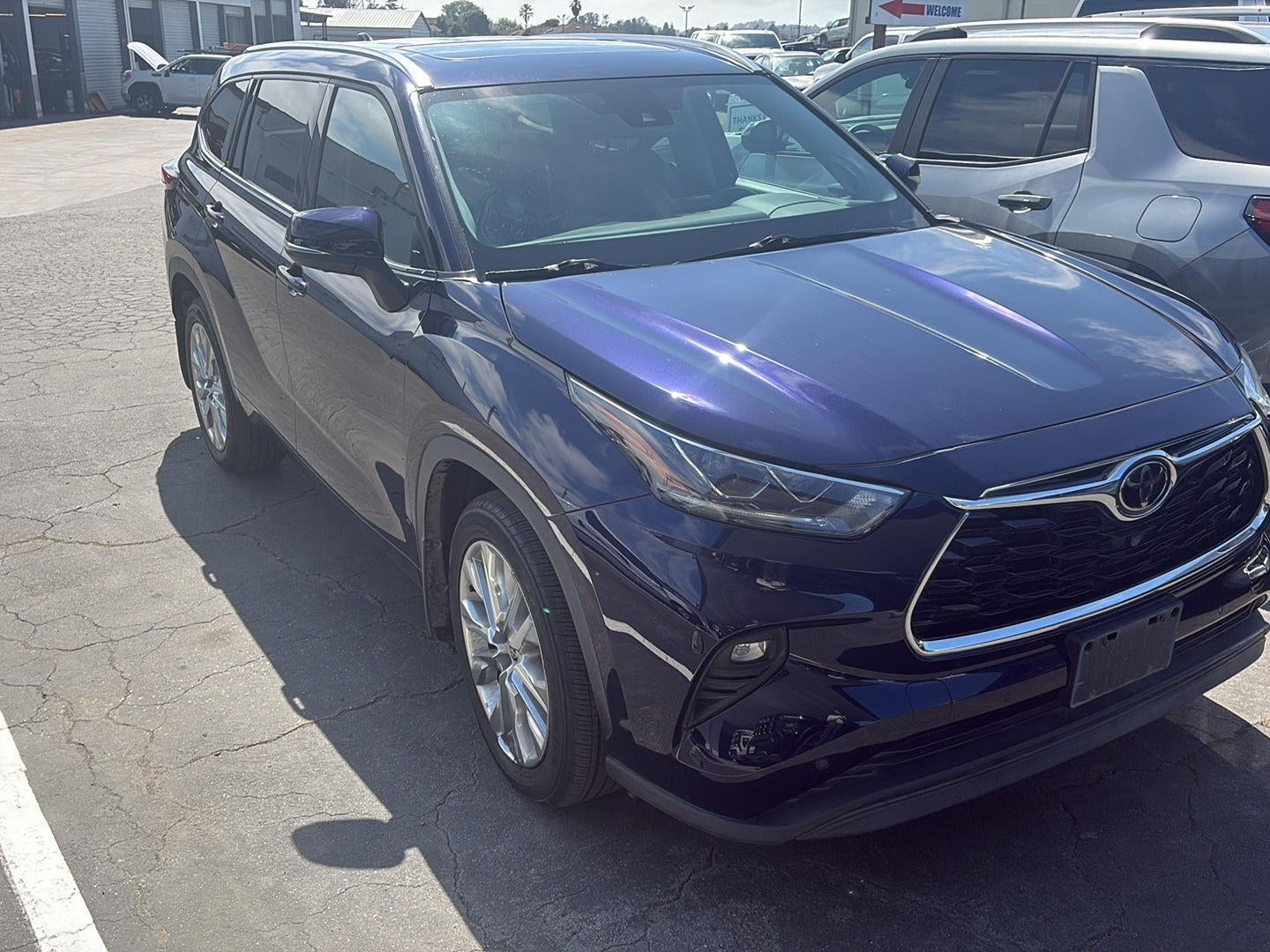 2021 Toyota Highlander Limited in Blue — front three-quarter view