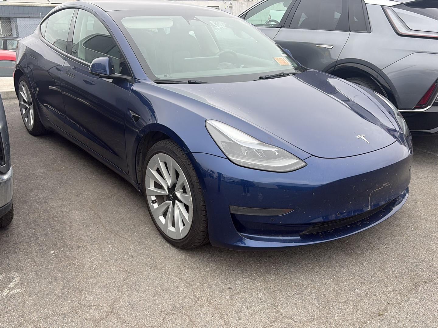 2022 Tesla Model 3 Base in Blue — front three-quarter view