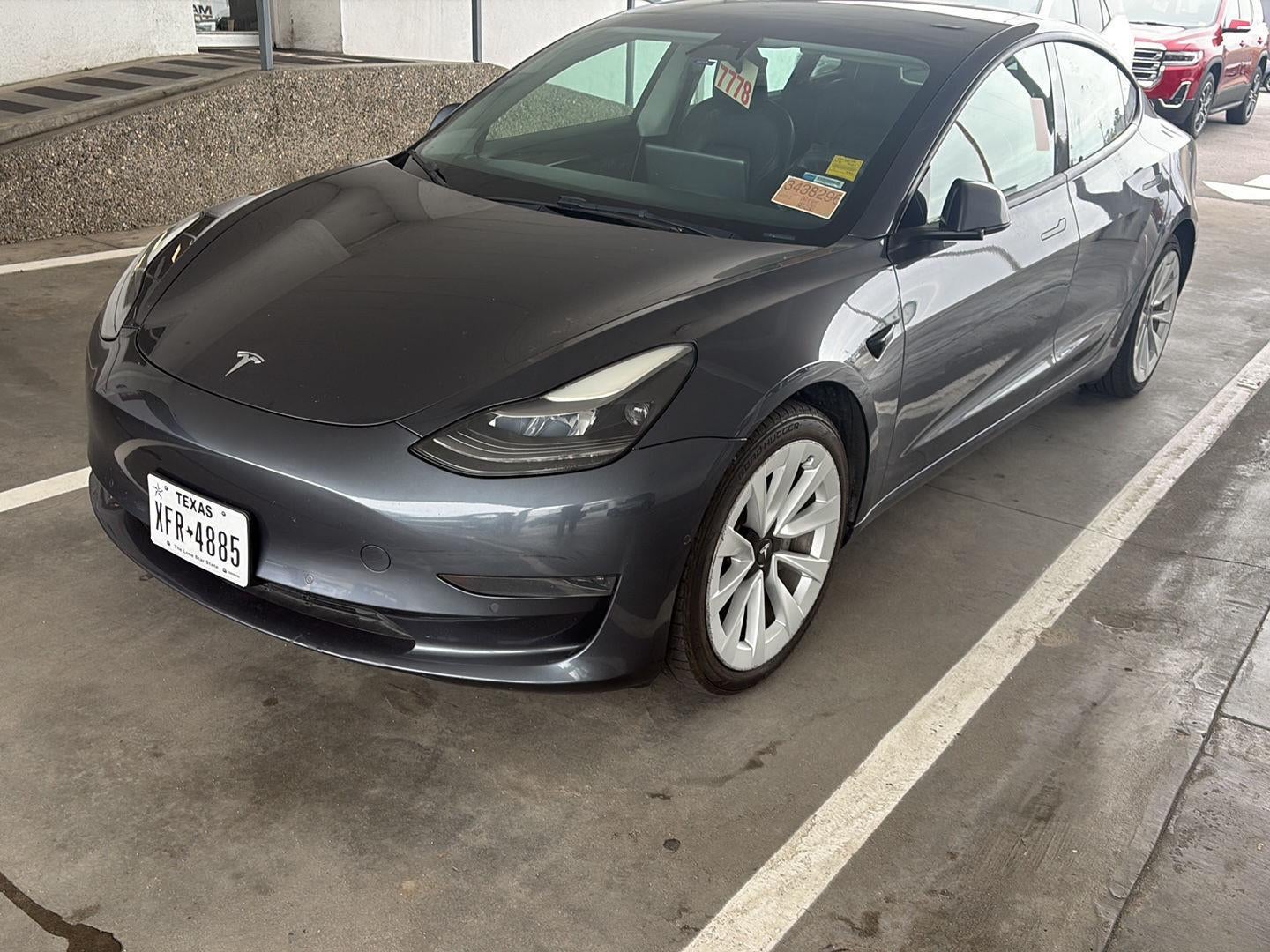 2022 Tesla Model 3 Base in Silver — front three-quarter view