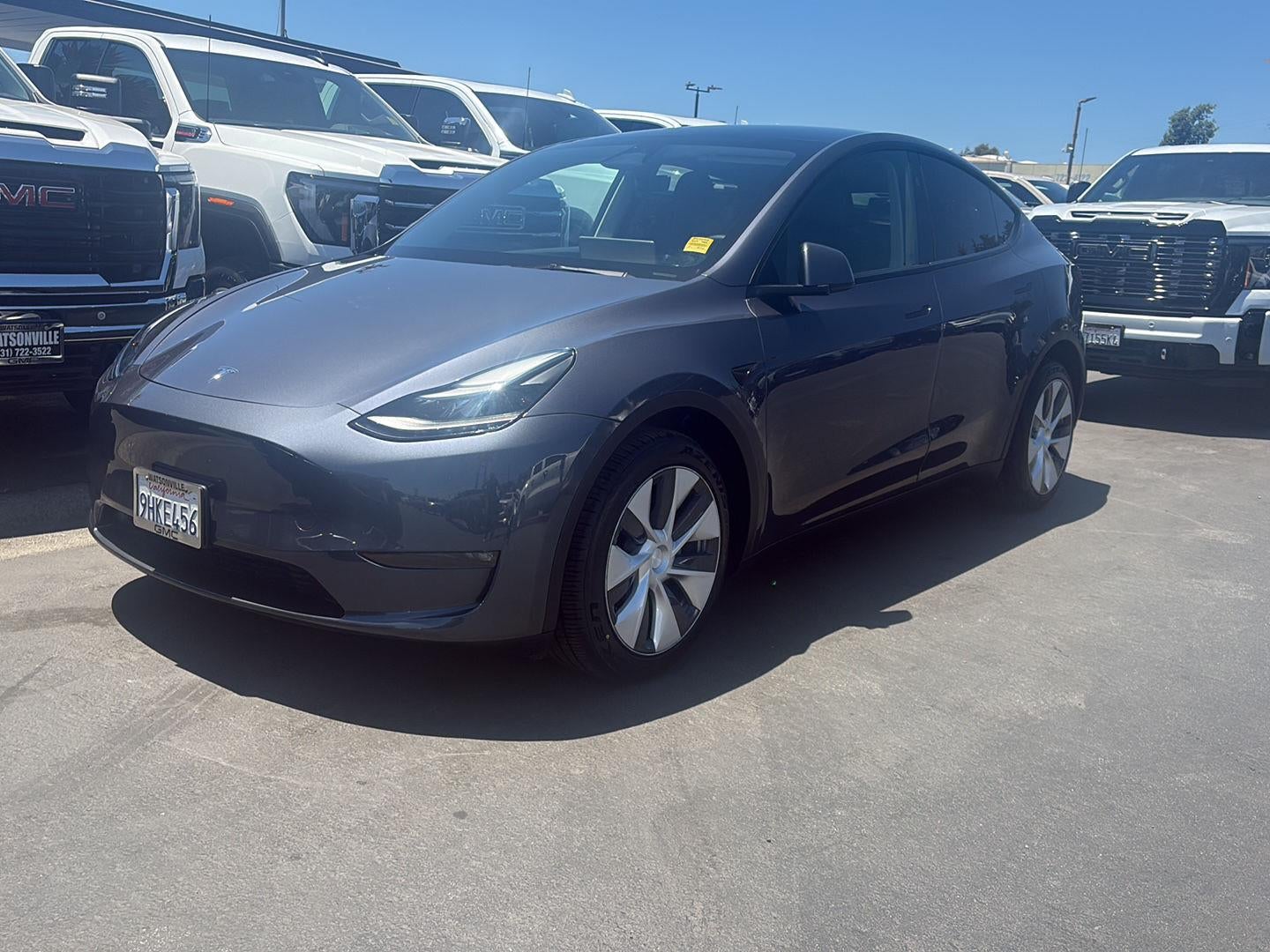 2023 Tesla Model Y Long Range in Gray — front three-quarter view