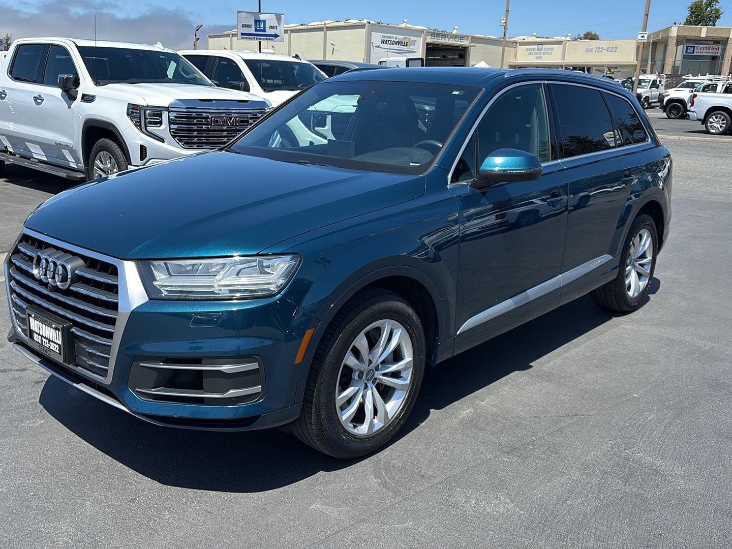 2018 Audi Q7 3.0T Premium in Blue — front three-quarter view